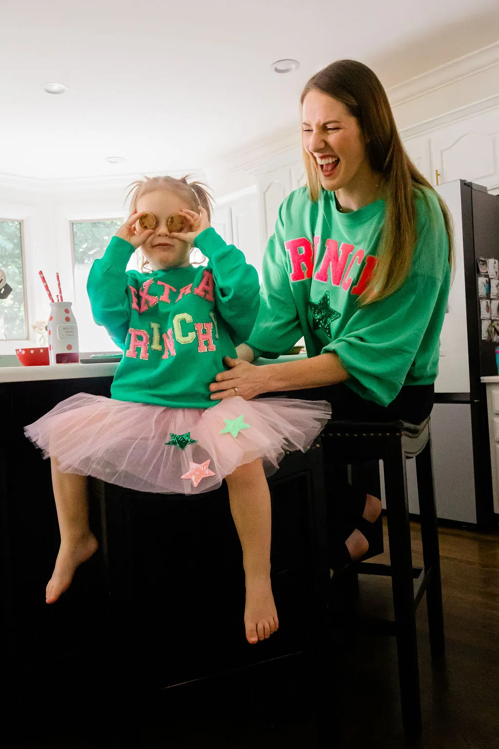 GRINCHY PINK VARSITY PULLOVER